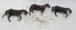 A Beswick pottery horse modelled as The Winner 2421, 24cm high, together with two matte... - 3