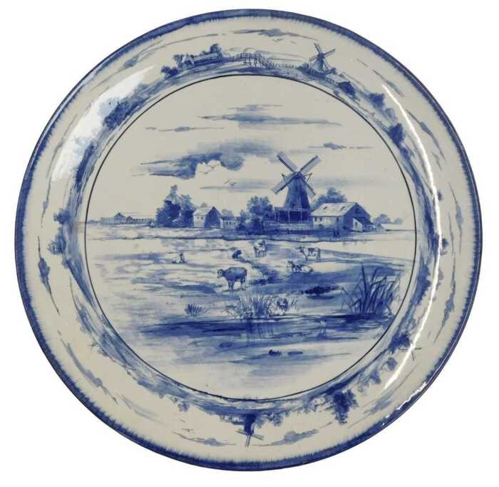 A Doulton Burslem pottery Norfolk pattern blue and white charger, printed marks, 40cm diameter.