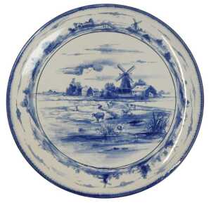 A Doulton Burslem pottery Norfolk pattern blue and white charger, printed marks, 40cm diameter.