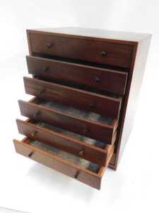 A 1970s teak tabletop chest, with a sloping top above five drawers, with a further faux drawer... - 3