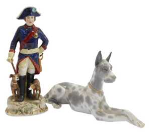 A Lladro porcelain figure, modelled as a recumbent Great Dane, 17.5cm high, together with a...