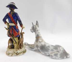 A Lladro porcelain figure, modelled as a recumbent Great Dane, 17.5cm high, together with a... - 2