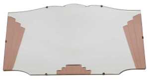 An Art Deco mirror, of rectangular form, with a shaped top and pink glass fan shaped panels to...