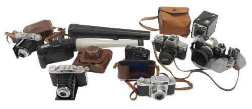 Cameras and optical related equipment, comprising a Fujifilm Instax 100, a Philips Explorer...