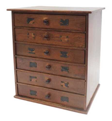 An early 20thC mahogany and oak tabletop office cabinet, with six oak-fronted drawers with...