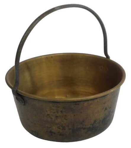 An early 20thC brass jam pan, with a wrought-iron handle, 34.5cm diameter.