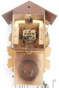 A West German Black Forest style part painted cuckoo clock, decorated with carved animals,... - 5