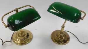 Two similar brass desk lamps, each with a green glass shade, raised on a circular, stepped and... - 2