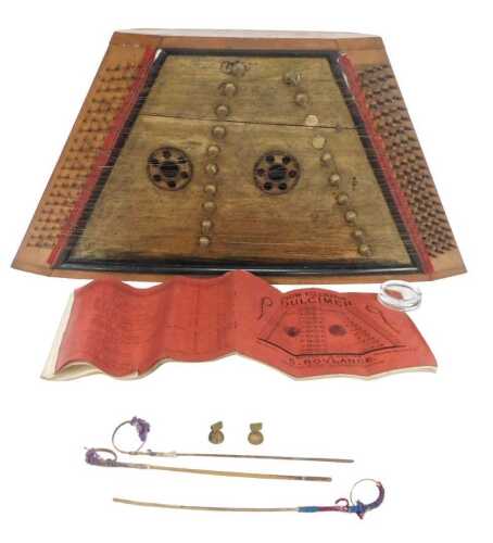 A hammered dulcimer, with gilt decoration, 74cm high, contained in a stained wooden box with...