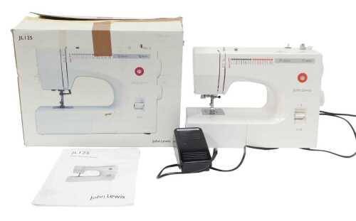 A John Lewis JL125 electric sewing machine, boxed.