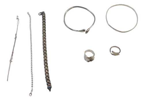 A group of silver and other costume jewellery, comprising two splayed twist bangles, a bead link...
