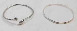 A group of silver and other costume jewellery, comprising two splayed twist bangles, a bead link... - 2