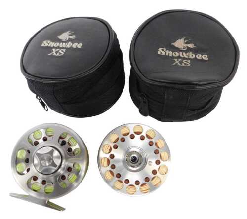A Pflueger Trion 2855 centrepin reel and spare cassette.