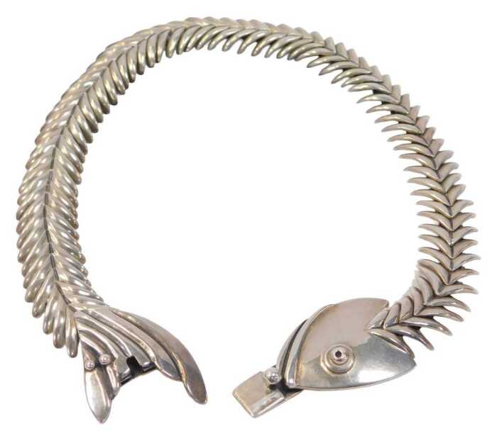 A D'Molina Mexican articulated fishbone necklace, with linked skeletal segments, stamped to fish...