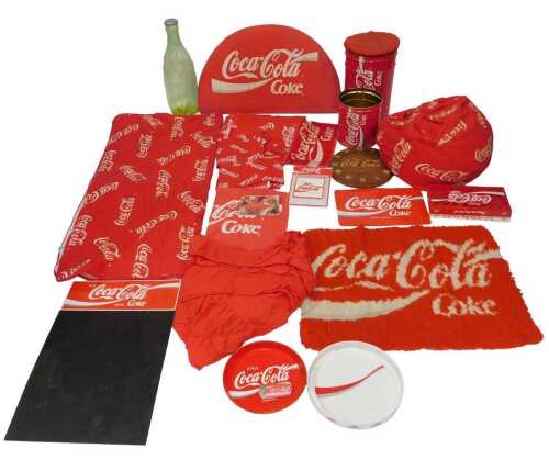 Coca-Cola memorabilia. A sleeping bag, bed linen, a single headboard, a chalkboard, trays,...