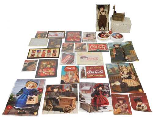Coca-Cola memorabilia. Franklin Heirloom Dolls Coca-Cola doll with wagon, collector's plates,...
