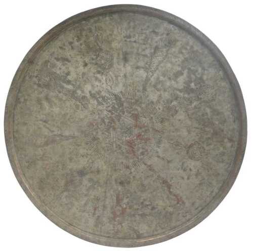 A Middle Eastern plated copper charger, decorated centrally with a star surrounded by repeating...