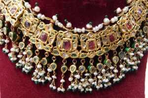 An antique enamel and gem set bridal necklace, the front set with an arrangement of green, red... - 7