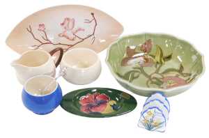 A group of Carltonware and Moorcroft pottery, including a Moorcroft Hibiscus pattern ashtray, a...