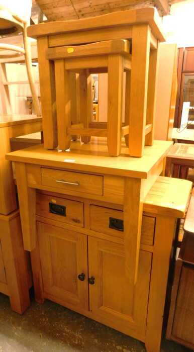 A group of contemporary oak furniture, comprising a nest of two tables, the largest 50cm high, a...