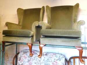 A pair of Parker Knoll armchairs, upholstered in green draylon fabric, model PK720-MK3.