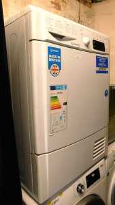 An Indesit 8kg tumble dryer, IDCE8450BH.