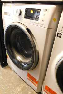 A Whirlpool 8kg steam inverter washing machine.