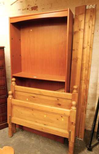 An open bookcase, together with a pine single bed, comprising headboard, footboard and side rails.
