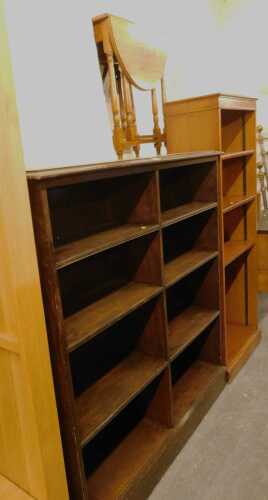 A group of furniture, comprising an oak gateleg table, an open bookcase, together with a further...