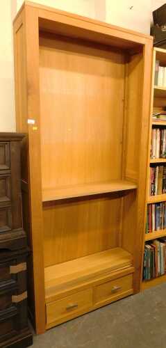 A contemporary oak open bookcase, 200cm high, 90cm wide, 29cm deep.