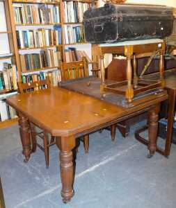 A group of furniture, to include a late Victorian mahogany extending dining table, the canted...