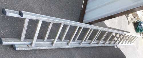 A metal extending ladder.
