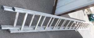 A metal extending ladder.
