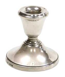 An Elizabeth II loaded silver squat candlestick, Birmingham 1973, 3.18oz, 6.5cm high.
