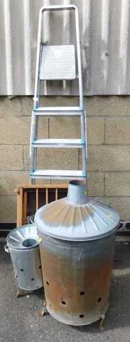 An A frame steel ladder, together with a director's type chair, garden statue of a gentleman in...