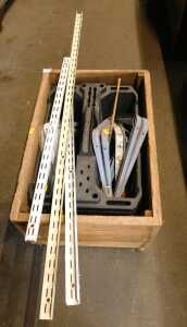 Various metal shelving racking, further shelving related items, etc., contained in a wooden box...