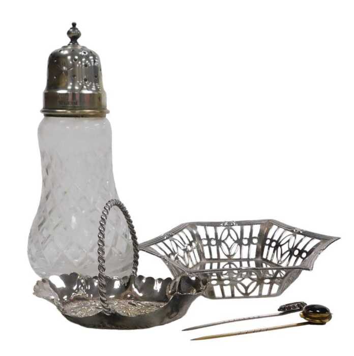 An Elizabeth II cut glass and silver lidded sugar sifter, Birmingham 1965, a hexagonal sweetmeat...
