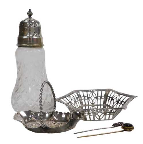 An Elizabeth II cut glass and silver lidded sugar sifter, Birmingham 1965, a hexagonal sweetmeat...