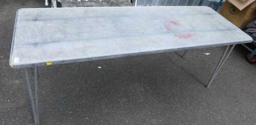 A metal folding table.