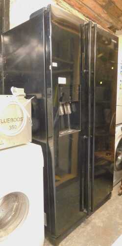 V - A Samsung fridge freezer, with ice dispenser.