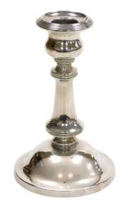 An Edward VII loaded silver candlestick, with reeded banding, Birmingham 1907, 11.29oz all in,...