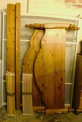 A pine double bed, comprising head board, foot board, base and side rails, together with a...