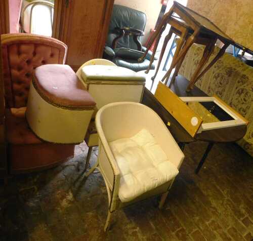 Two white painted Lloyd Loom style chairs with ottomans, a pink velor chair, together with a...