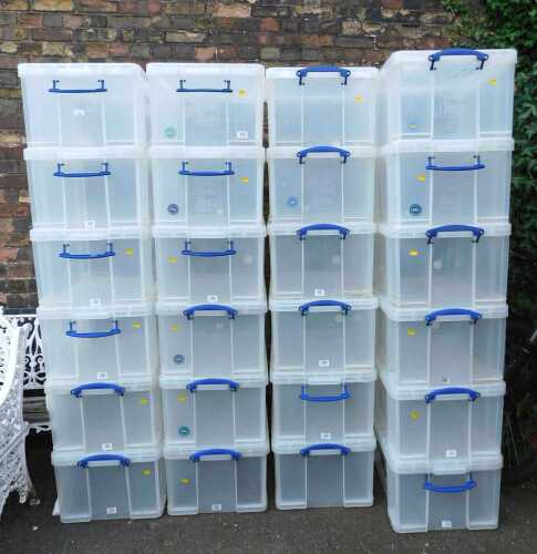 Twenty-four Really Useful plastic storage boxes with lids, 64L capacity.