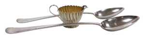 An Edward VII silver cream jug, of spiral fluted form, Birmingham 1902, 1.61oz, together with a...