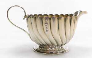An Edward VII silver cream jug, of spiral fluted form, Birmingham 1902, 1.61oz, together with a... - 4