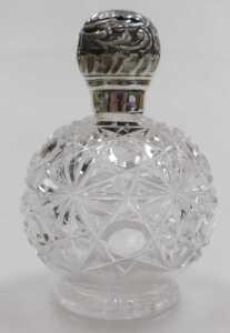 A Victorian cut glass scent bottle, with a silver mount and screw lid, embossed with flowers and... - 2