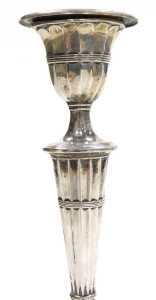 A pair of George V Adams style loaded silver candlesticks, of fluted form, raised on outswept... - 2