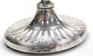 A pair of George V Adams style loaded silver candlesticks, of fluted form, raised on outswept... - 3