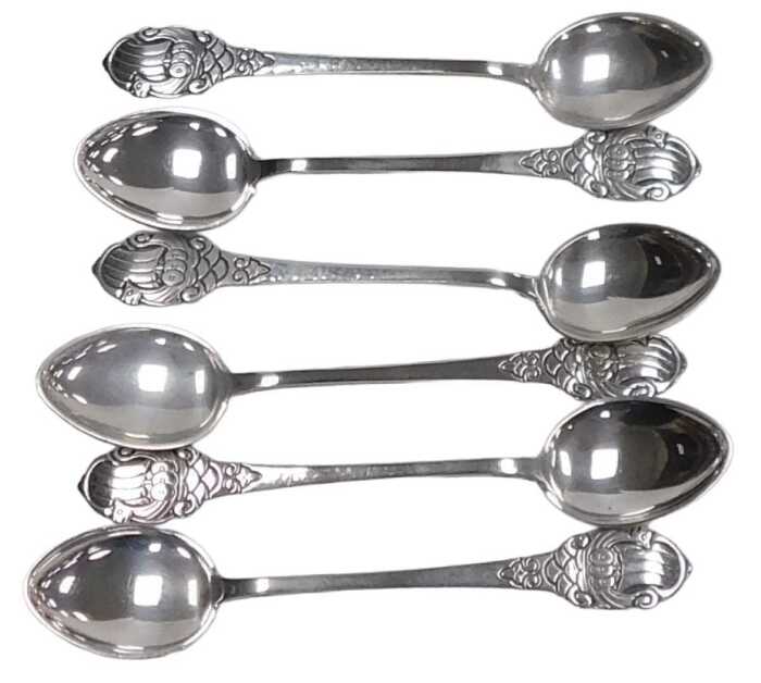A set of six Norwegian Norne silver coffee spoons, with longboat terminals, cased, stamped 830,...